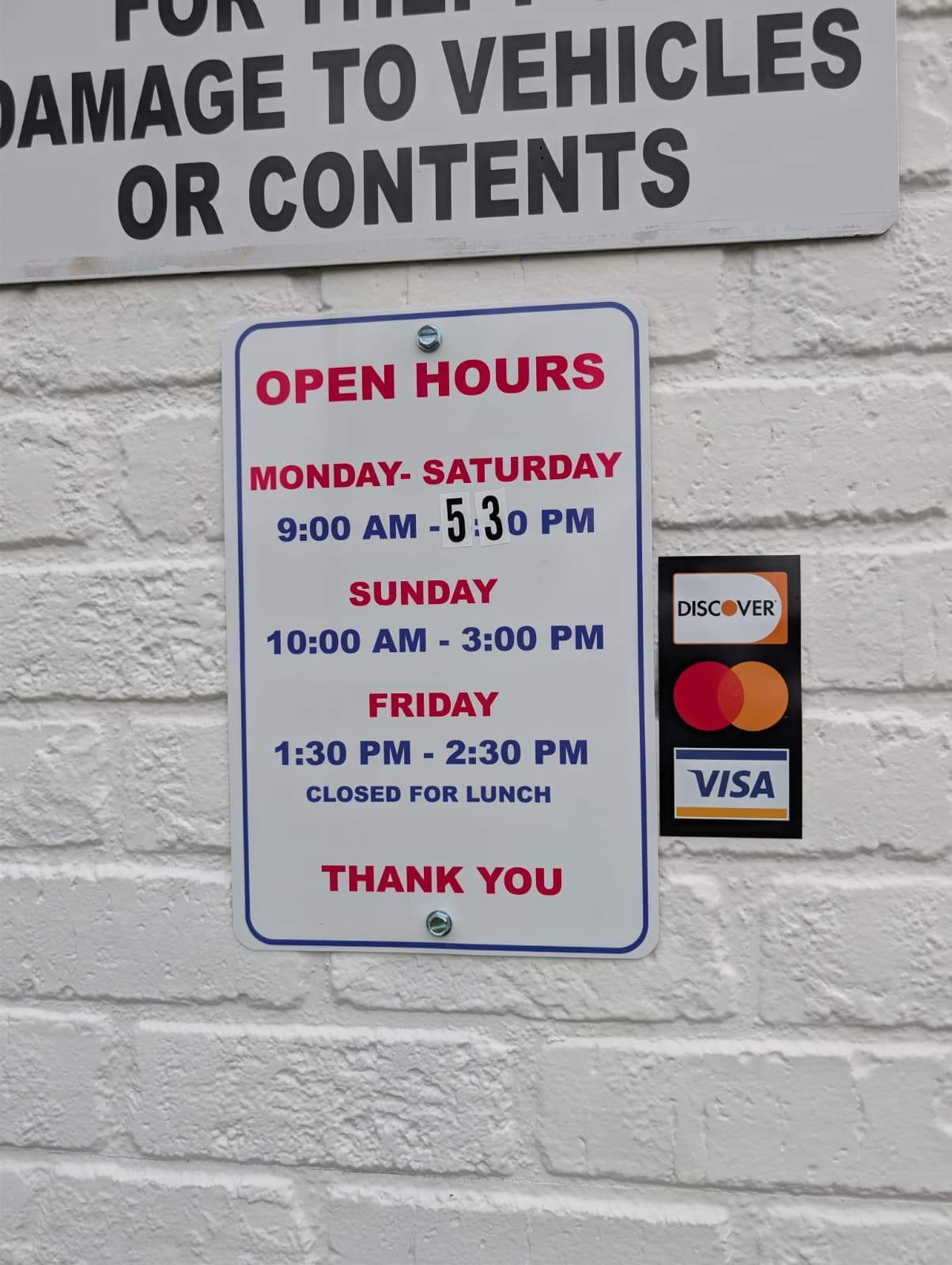 Posted open hours sign
